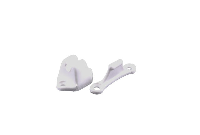 Two-part door stopper, white color.